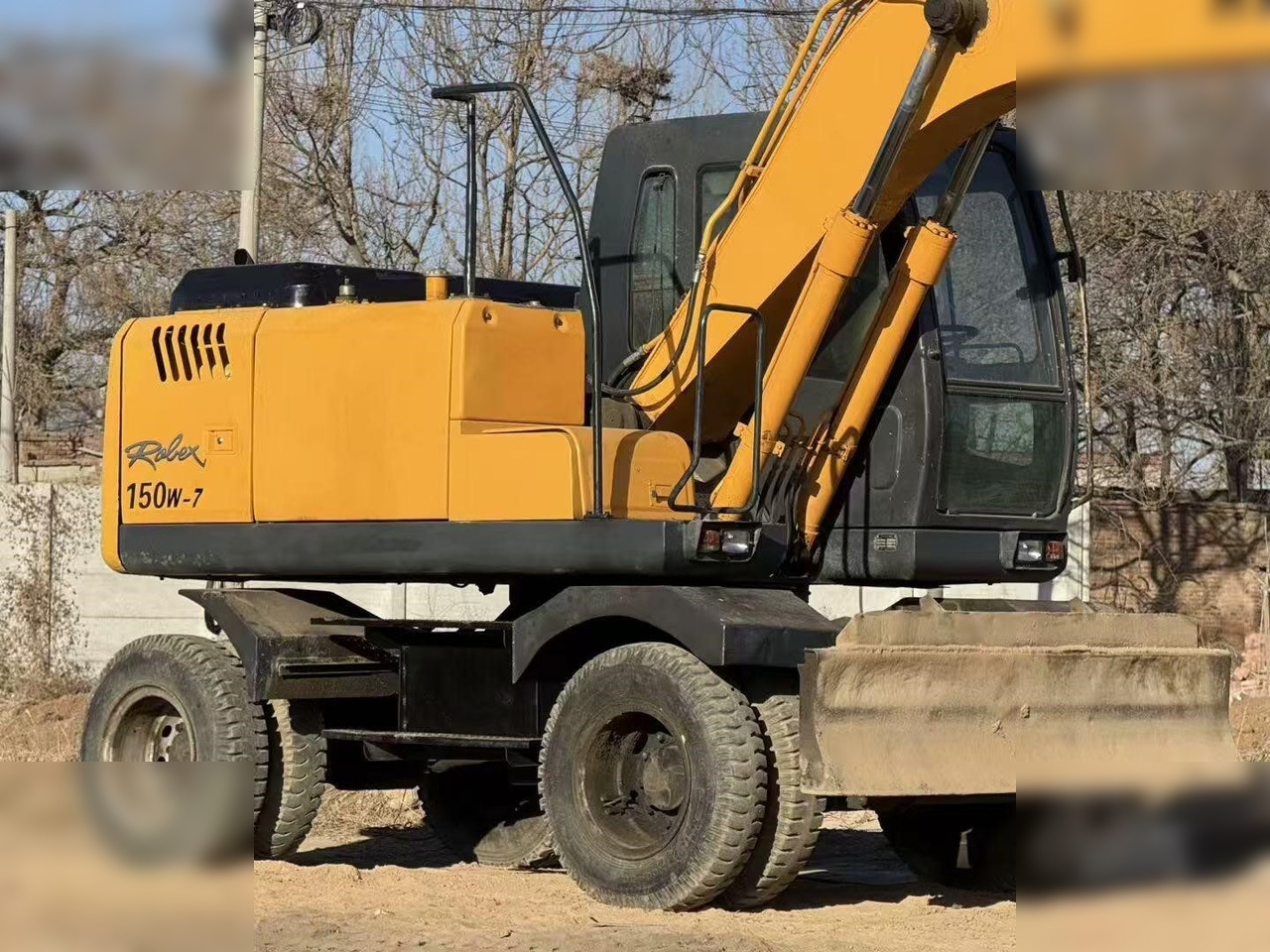 HYUNDAI ROBEX 150W-7A - حفارة دولاب: صورة 4 HYUNDAI ROBEX 150W-7A - حفارة دولاب: صورة 4