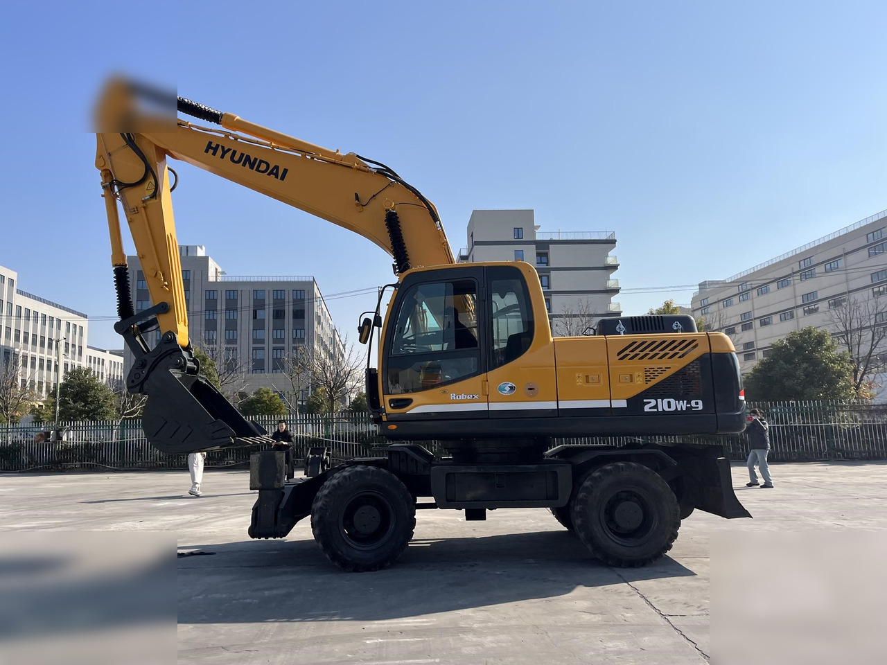 HYUNDAI ROBEX 210W-9 - حفارة دولاب: صورة 1 HYUNDAI ROBEX 210W-9 - حفارة دولاب: صورة 1