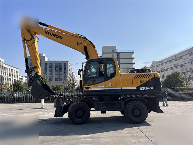 HYUNDAI ROBEX 210W-9 - حفارة دولاب: صورة 1 HYUNDAI ROBEX 210W-9 - حفارة دولاب: صورة 1