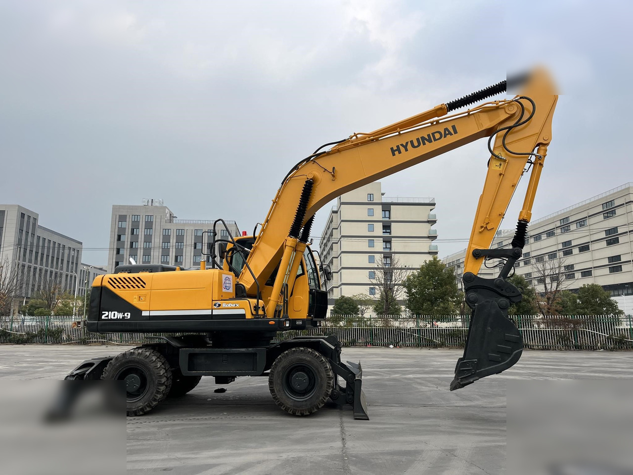 HYUNDAI ROBEX 210W-9 - حفارة دولاب: صورة 4 HYUNDAI ROBEX 210W-9 - حفارة دولاب: صورة 4