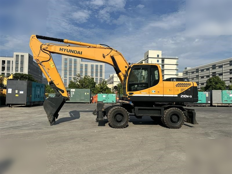 HYUNDAI ROBEX 210W-9 - حفارة دولاب: صورة 1 HYUNDAI ROBEX 210W-9 - حفارة دولاب: صورة 1