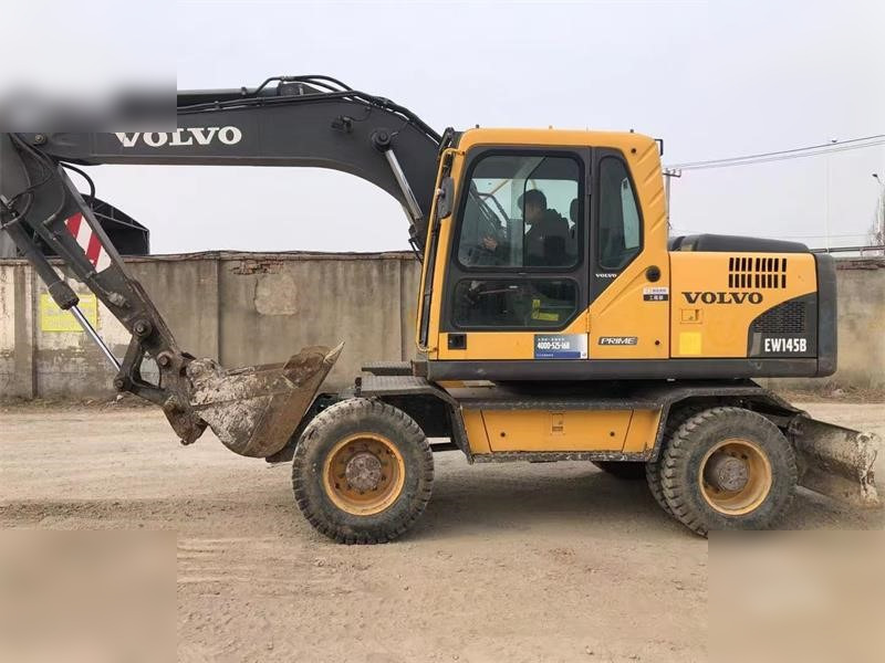 VOLVO EW145B - حفارة دولاب: صورة 2 VOLVO EW145B - حفارة دولاب: صورة 2