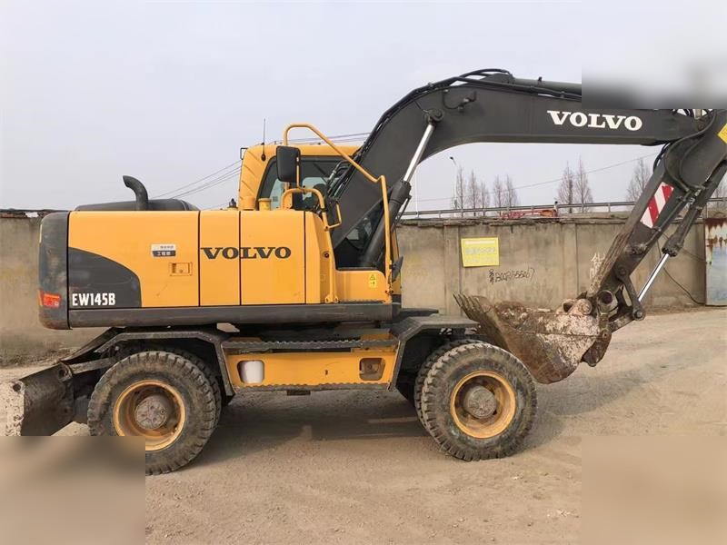 VOLVO EW145B - حفارة دولاب: صورة 1 VOLVO EW145B - حفارة دولاب: صورة 1