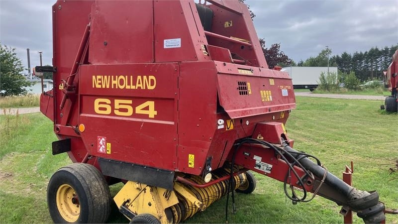 New Holland 654 RUNDBALLEPRESSER Cropcutter - مكنة: صورة 1 New Holland 654 RUNDBALLEPRESSER Cropcutter - مكنة: صورة 1