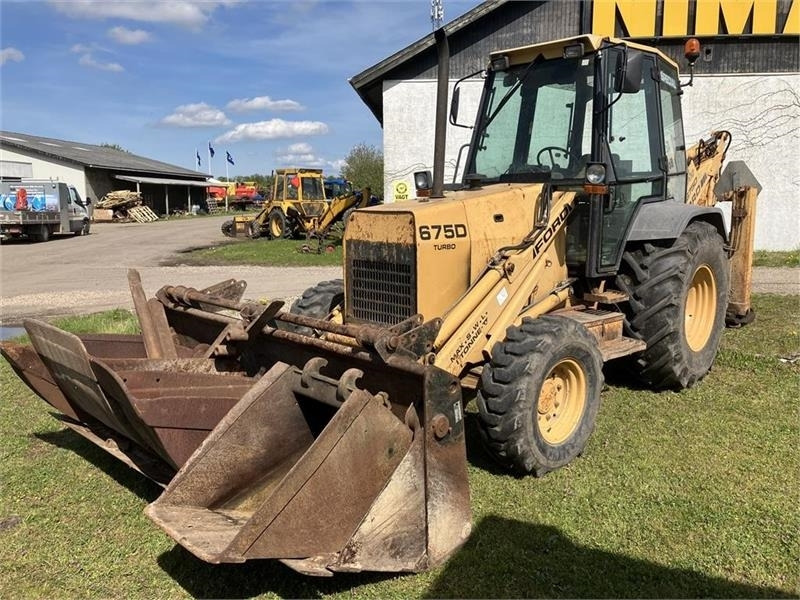 New Holland 675D - جرافة حفار: صورة 1 New Holland 675D - جرافة حفار: صورة 1