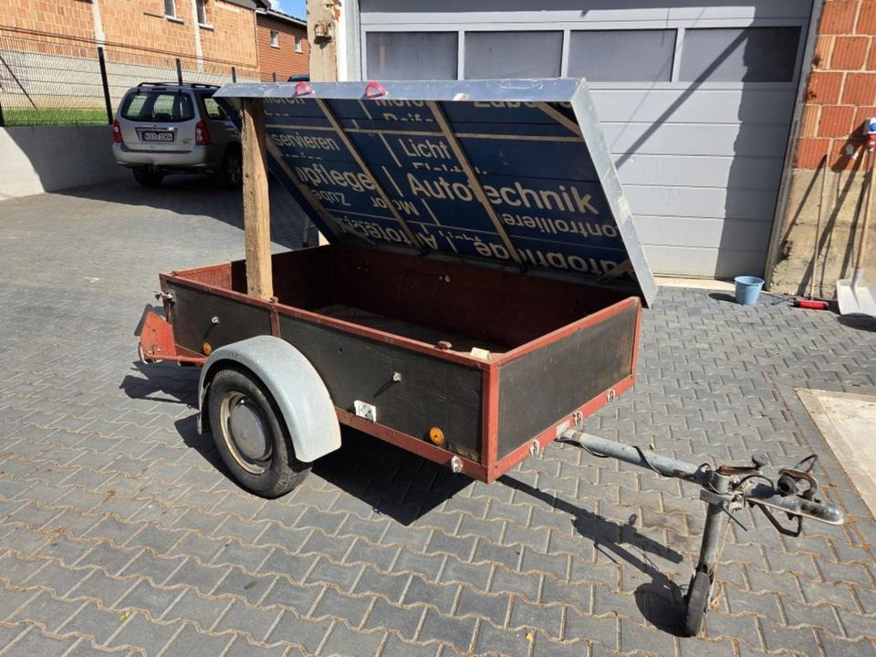 PKW-Anhänger mit Deckel Stützrad TÜV Neu 600 kg - مقطورة سيارة: صورة 1 PKW-Anhänger mit Deckel Stützrad TÜV Neu 600 kg - مقطورة سيارة: صورة 1