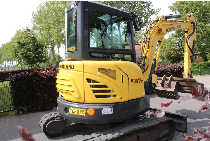 New Holland E37C binnendraaier - رافعة عنكبوتية: صورة 4 New Holland E37C binnendraaier - رافعة عنكبوتية: صورة 4