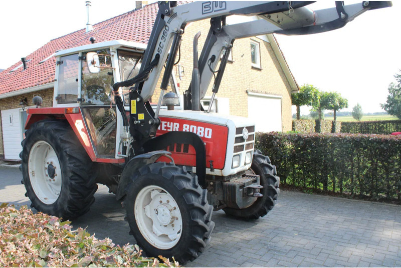 Steyr 8080 met voorlader 40 kmh - جرار: صورة 1 Steyr 8080 met voorlader 40 kmh - جرار: صورة 1