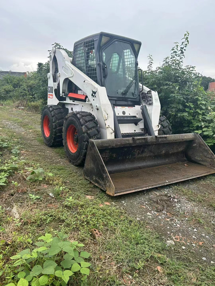 BOBCAT S300 - شيول صغير: صورة 1 BOBCAT S300 - شيول صغير: صورة 1