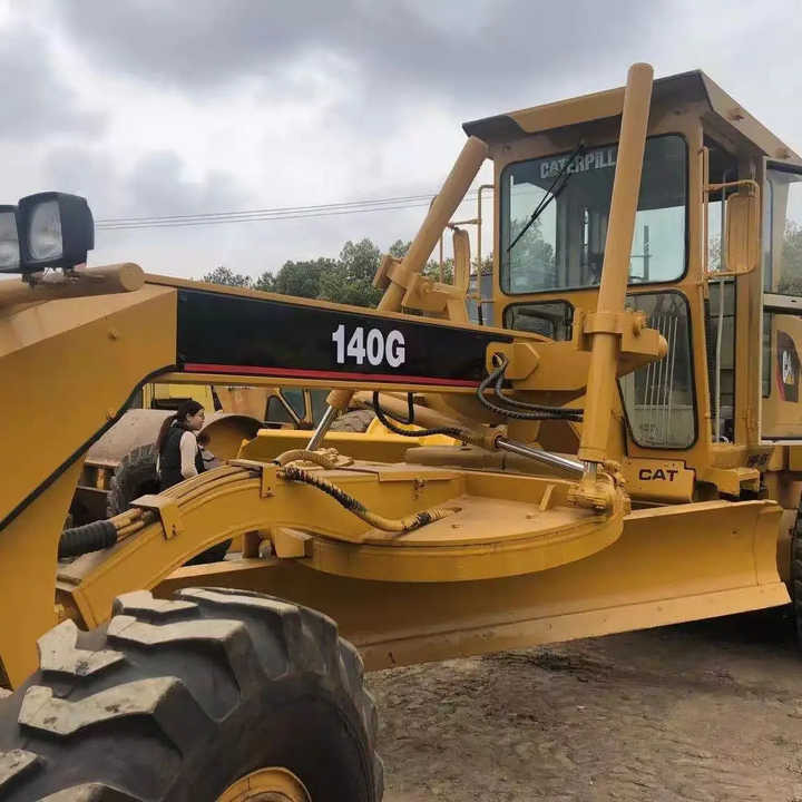 Used Caterpillar CAT 140G Land Road Motor Grader CAT140G CAT Used Grader Cheap Price - ممهدة: صورة 1 Used Caterpillar CAT 140G Land Road Motor Grader CAT140G CAT Used Grader Cheap Price - ممهدة: صورة 1