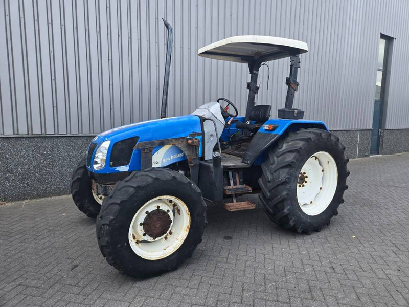 New Holland TL 90 A - جرار: صورة 1 New Holland TL 90 A - جرار: صورة 1
