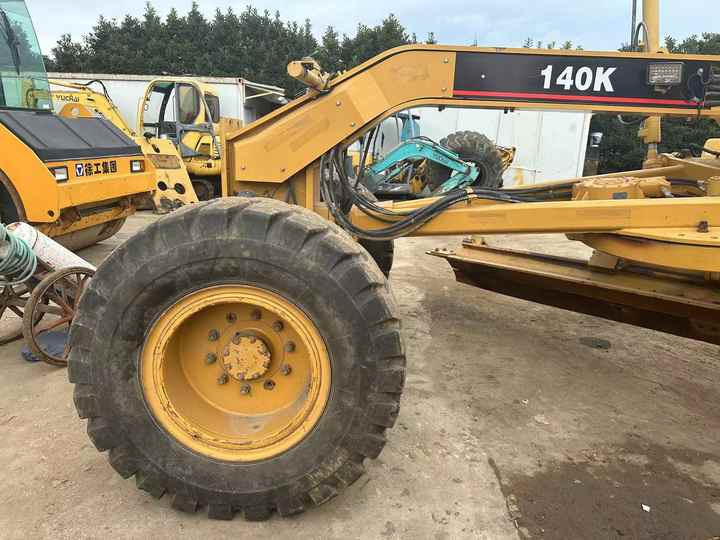 Used Caterpillar CAT 140k Land Road Motor Grader CAT140k Used Grader Cheap Price for Sale - ممهدة: صورة 4 Used Caterpillar CAT 140k Land Road Motor Grader CAT140k Used Grader Cheap Price for Sale - ممهدة: صورة 4