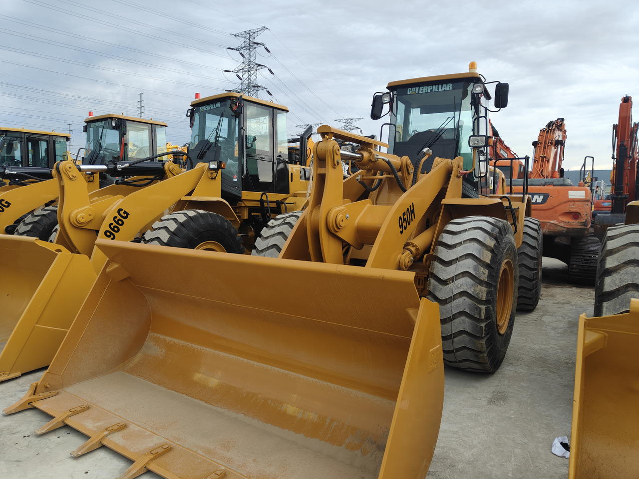 CATERPILLAR 950H - اللودر بعجل: صورة 1 CATERPILLAR 950H - اللودر بعجل: صورة 1