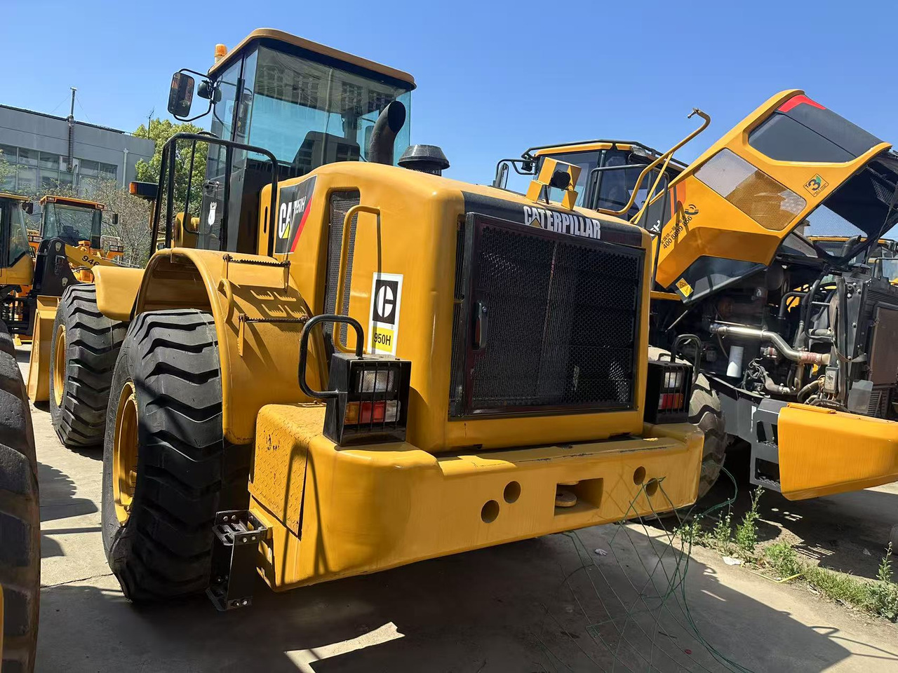 CATERPILLAR 950H - اللودر بعجل: صورة 1 CATERPILLAR 950H - اللودر بعجل: صورة 1