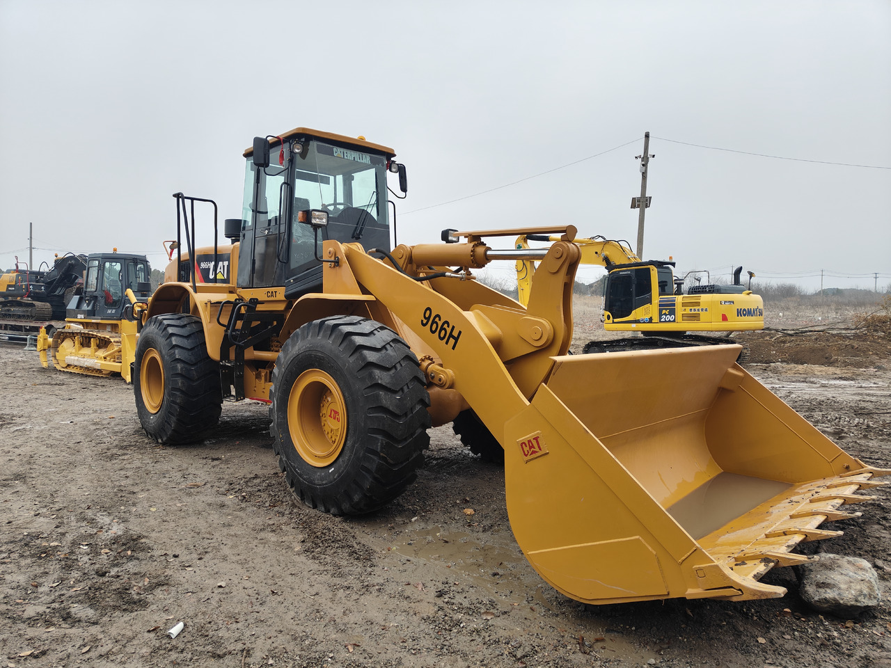 CATERPILLAR 966H - اللودر بعجل: صورة 1 CATERPILLAR 966H - اللودر بعجل: صورة 1