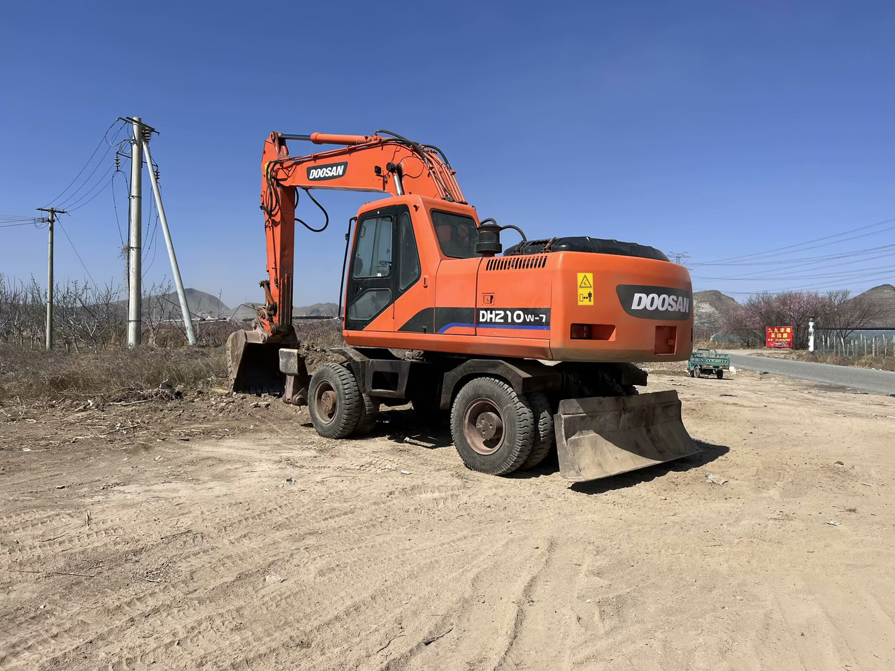 DOOSAN DH210W-7 - حفارة دولاب: صورة 3 DOOSAN DH210W-7 - حفارة دولاب: صورة 3