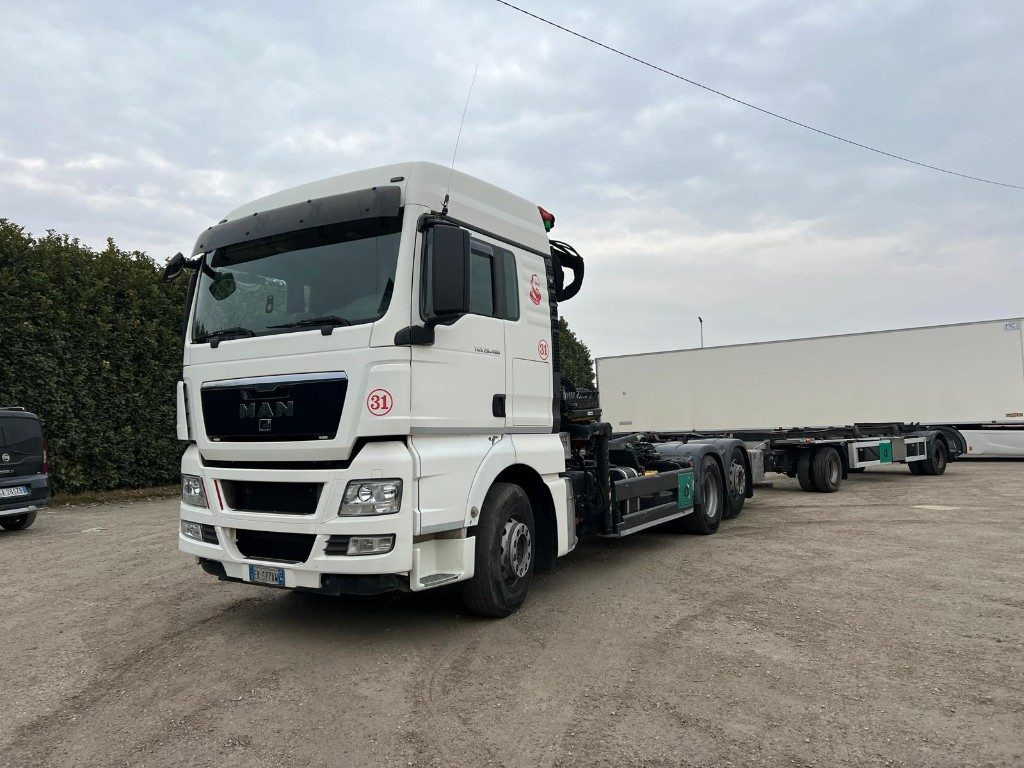 MAN TGX 26.480 SCARRABILE CON GRU - شاحنة ذات خطاف: صورة 1 MAN TGX 26.480 SCARRABILE CON GRU - شاحنة ذات خطاف: صورة 1