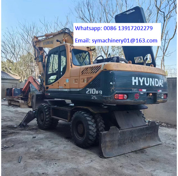 Hyundai R210W - حفارة دولاب: صورة 1 Hyundai R210W - حفارة دولاب: صورة 1