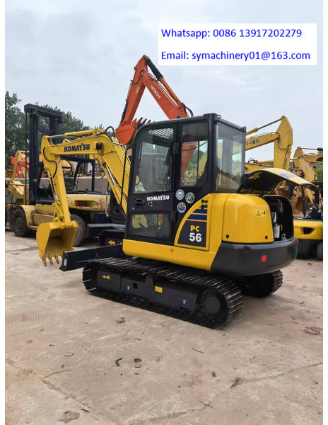 Komatsu PC56 - حفارة مُصَّغرة: صورة 1 Komatsu PC56 - حفارة مُصَّغرة: صورة 1