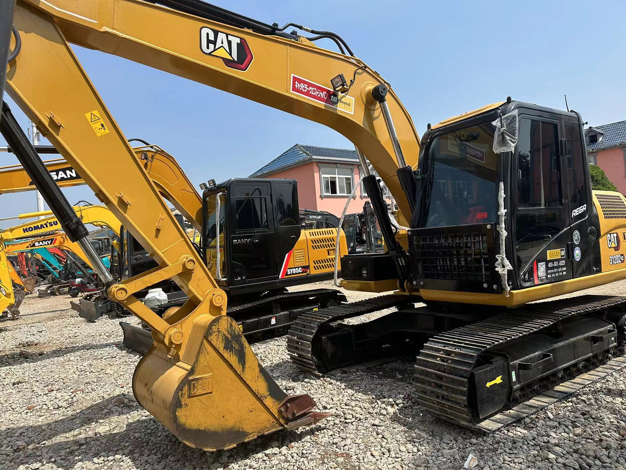 CATERPILLAR 312D Wheel Excavator Click for Discount - حفار زحاف: صورة 1 CATERPILLAR 312D Wheel Excavator Click for Discount - حفار زحاف: صورة 1