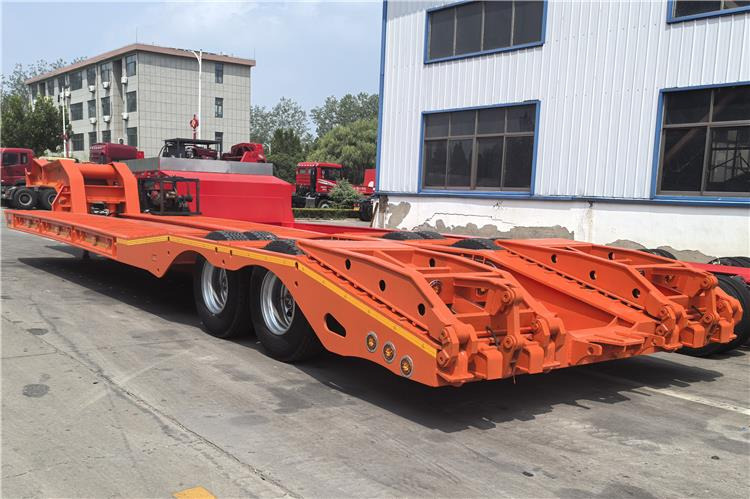 TITAN 2 Axle Low Low Bed Trailer for Sale In Angola - عربة منخفضة مسطحة نصف مقطورة: صورة 2 TITAN 2 Axle Low Low Bed Trailer for Sale In Angola - عربة منخفضة مسطحة نصف مقطورة: صورة 2