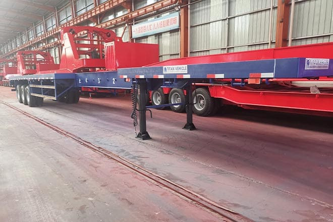 TITAN 3 Axle Extendable Flatbed Trailers for Sale in Angola - نصف مقطورة مسطحة: صورة 1 TITAN 3 Axle Extendable Flatbed Trailers for Sale in Angola - نصف مقطورة مسطحة: صورة 1