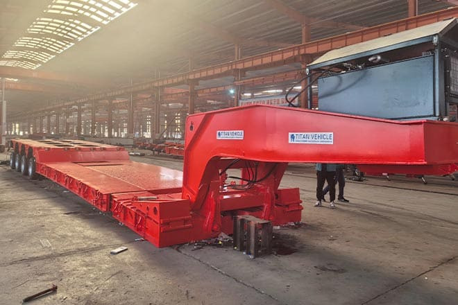 TITAN 4 Axle Extendable Lowboy Trailer for Sale in Nigeria - عربة منخفضة مسطحة نصف مقطورة: صورة 1 TITAN 4 Axle Extendable Lowboy Trailer for Sale in Nigeria - عربة منخفضة مسطحة نصف مقطورة: صورة 1