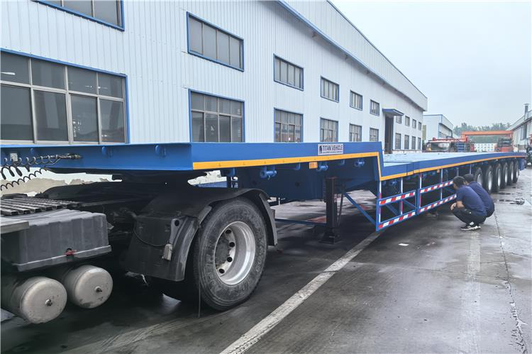 TITAN 6 Axle 54m Telescopic Flatbed Trailer for Sale In Angola - نصف مقطورة مسطحة: صورة 1 TITAN 6 Axle 54m Telescopic Flatbed Trailer for Sale In Angola - نصف مقطورة مسطحة: صورة 1