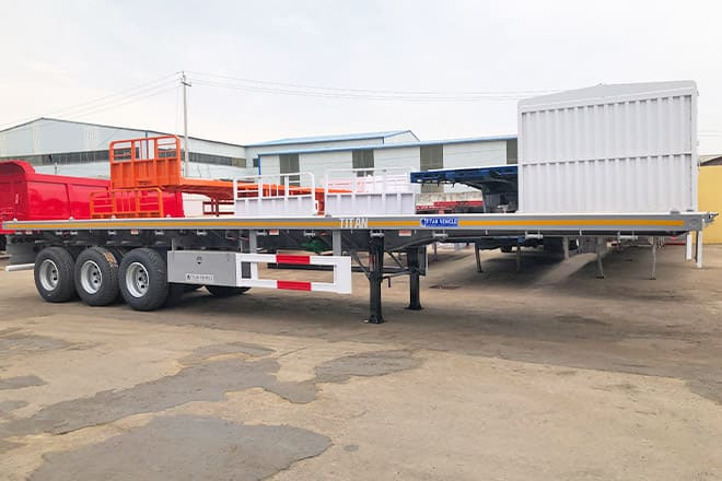 TITAN Tri Axle 40Ft Flatbed Trailer Price for Sale in Sierra Leone - نصف مقطورة مسطحة: صورة 5 TITAN Tri Axle 40Ft Flatbed Trailer Price for Sale in Sierra Leone - نصف مقطورة مسطحة: صورة 5