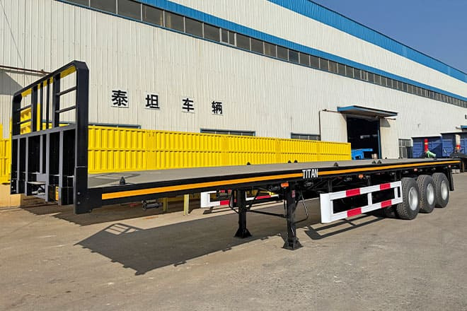 TITAN Tri Axle Flatbed Trailer for Sale in Jamaica - نصف مقطورة مسطحة: صورة 1 TITAN Tri Axle Flatbed Trailer for Sale in Jamaica - نصف مقطورة مسطحة: صورة 1