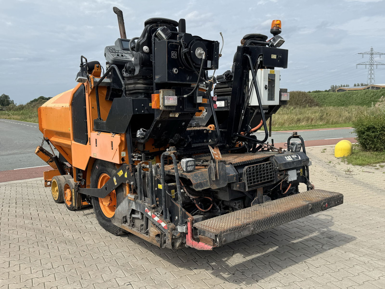Caterpillar AP300F - مدادة الأسفلت: صورة 4 Caterpillar AP300F - مدادة الأسفلت: صورة 4