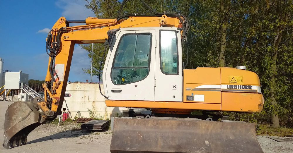 Liebherr A316 - حفارة دولاب: صورة 1 Liebherr A316 - حفارة دولاب: صورة 1