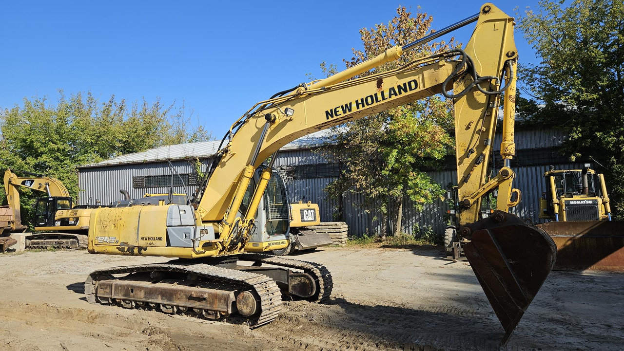 NEW HOLLAND E 245 B - حفار زحاف: صورة 4 NEW HOLLAND E 245 B - حفار زحاف: صورة 4