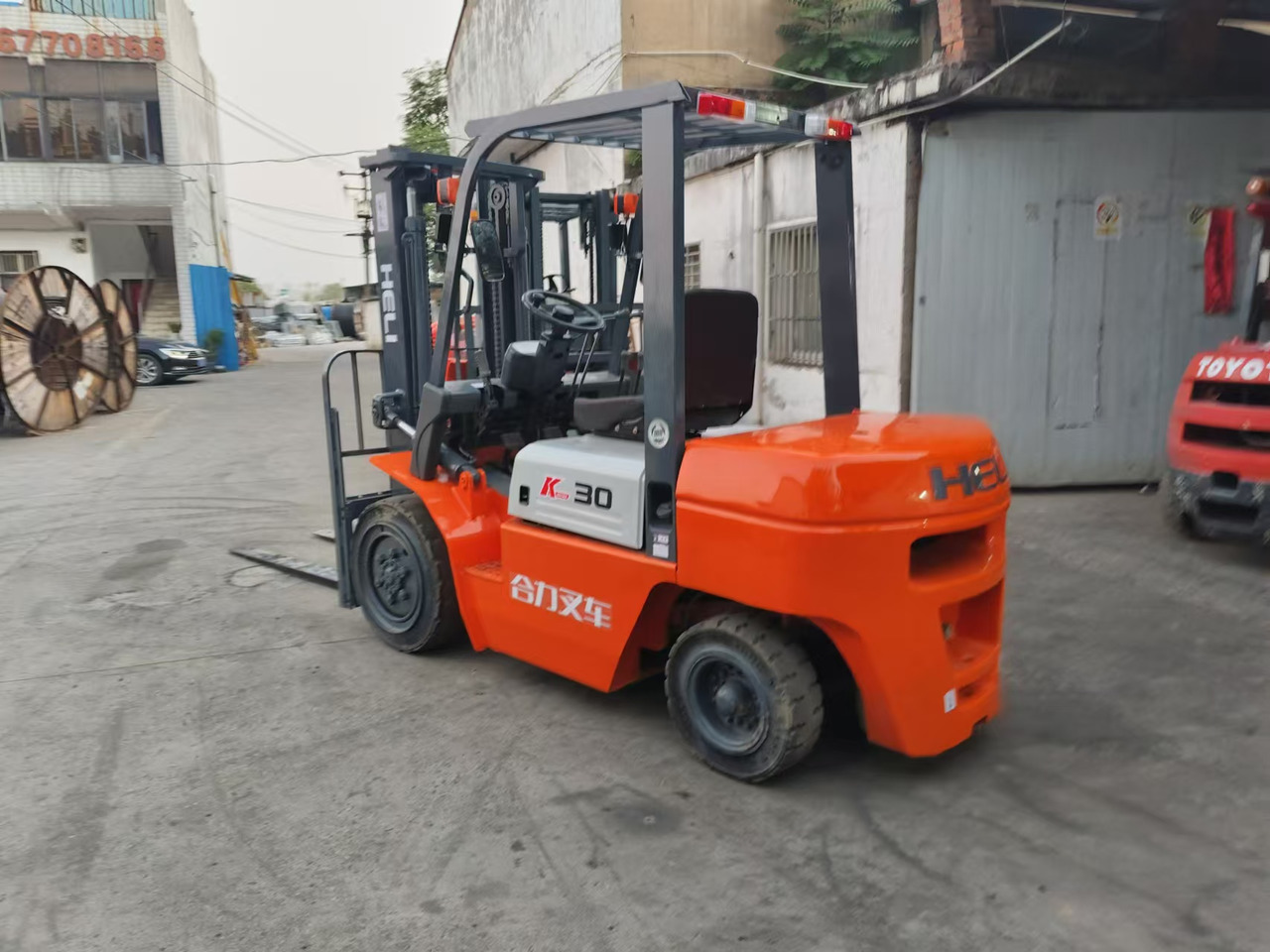HELI k30 used 3 ton diesel forklift Customizable mast clamps low price - رافعة شوكية ديزل: صورة 3 HELI k30 used 3 ton diesel forklift Customizable mast clamps low price - رافعة شوكية ديزل: صورة 3