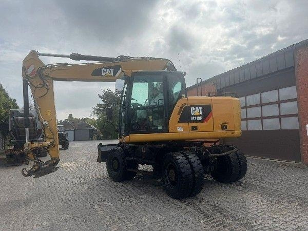 CAT M318F - حفارة دولاب: صورة 2 CAT M318F - حفارة دولاب: صورة 2