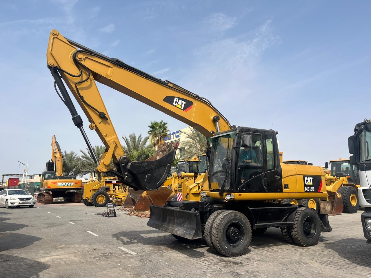 CATERPILLAR M318D - حفارة دولاب: صورة 1 CATERPILLAR M318D - حفارة دولاب: صورة 1