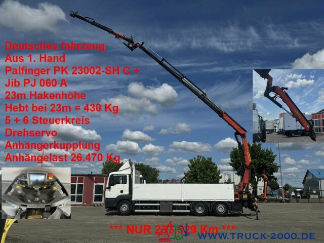 MAN TGS 26.400 PK 23002 mit Jib 23m Hakenhöhe 237TKM - شاحنات مسطحة, شاحنة كرين: صورة 1 MAN TGS 26.400 PK 23002 mit Jib 23m Hakenhöhe 237TKM - شاحنات مسطحة, شاحنة كرين: صورة 1