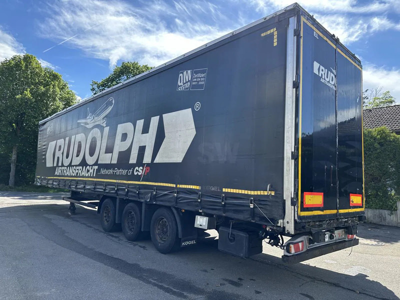 Kögel MEGA Tautliner mit ROLLENBETT Flughafentr. MEGA Tautliner mit ROLLENBETT Flughafentr. - نصف مقطورة صندوق مغلق: صورة 3 Kögel MEGA Tautliner mit ROLLENBETT Flughafentr. MEGA Tautliner mit ROLLENBETT Flughafentr. - نصف مقطورة صندوق مغلق: صورة 3