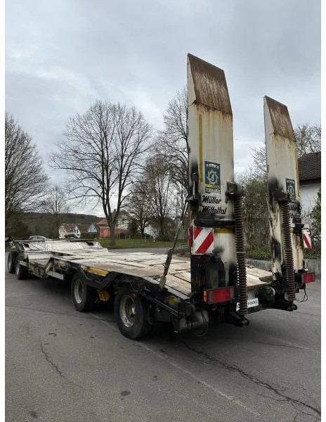 Müller-Mitteltal T4 4-Achs Tieflader Radmulden luftgefedert T4 4-Achs Tieflader Radmulden luftgefedert - مقطورة مسطحة منخفضة: صورة 5 Müller-Mitteltal T4 4-Achs Tieflader Radmulden luftgefedert T4 4-Achs Tieflader Radmulden luftgefedert - مقطورة مسطحة منخفضة: صورة 5