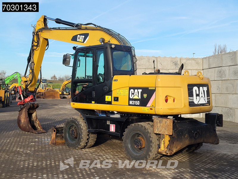 Caterpillar M315 D OUTRIGGERS + BLADE - حفارة دولاب: صورة 5 Caterpillar M315 D OUTRIGGERS + BLADE - حفارة دولاب: صورة 5