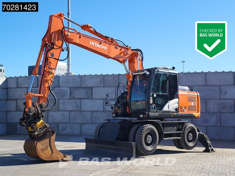 Hitachi ZX140W -5 OUTRIGGERS + BLADE - حفارة دولاب: صورة 1 Hitachi ZX140W -5 OUTRIGGERS + BLADE - حفارة دولاب: صورة 1