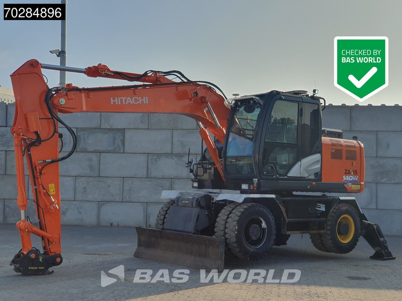 Hitachi ZX140W -6 OUTRIGGERS + BLADE - حفارة دولاب: صورة 1 Hitachi ZX140W -6 OUTRIGGERS + BLADE - حفارة دولاب: صورة 1