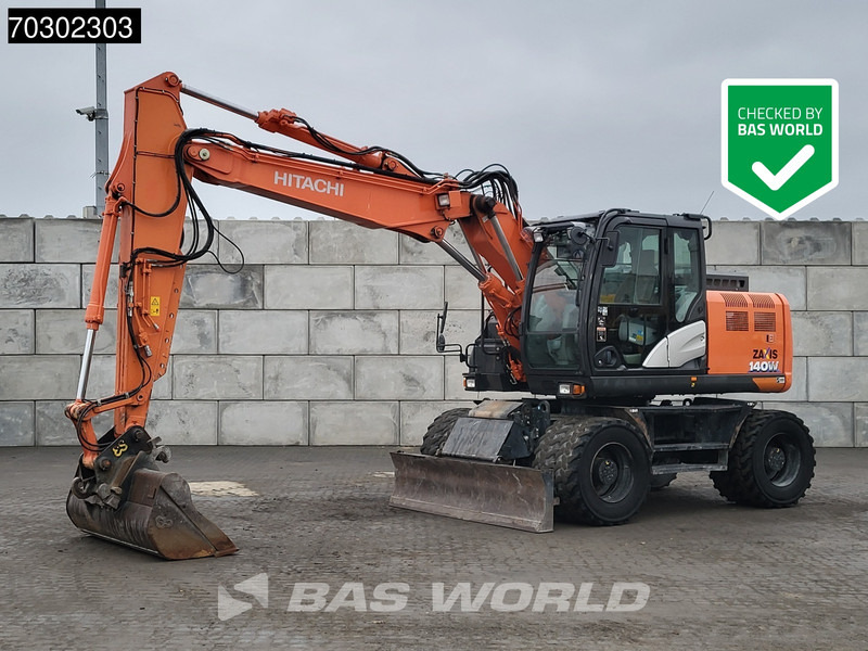Hitachi ZX140W -6 - حفارة دولاب: صورة 1 Hitachi ZX140W -6 - حفارة دولاب: صورة 1