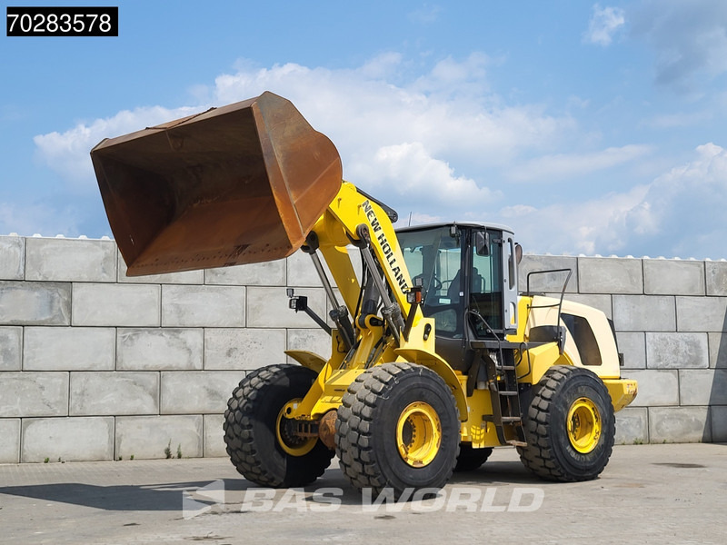 New Holland W270 - اللودر بعجل: صورة 2 New Holland W270 - اللودر بعجل: صورة 2