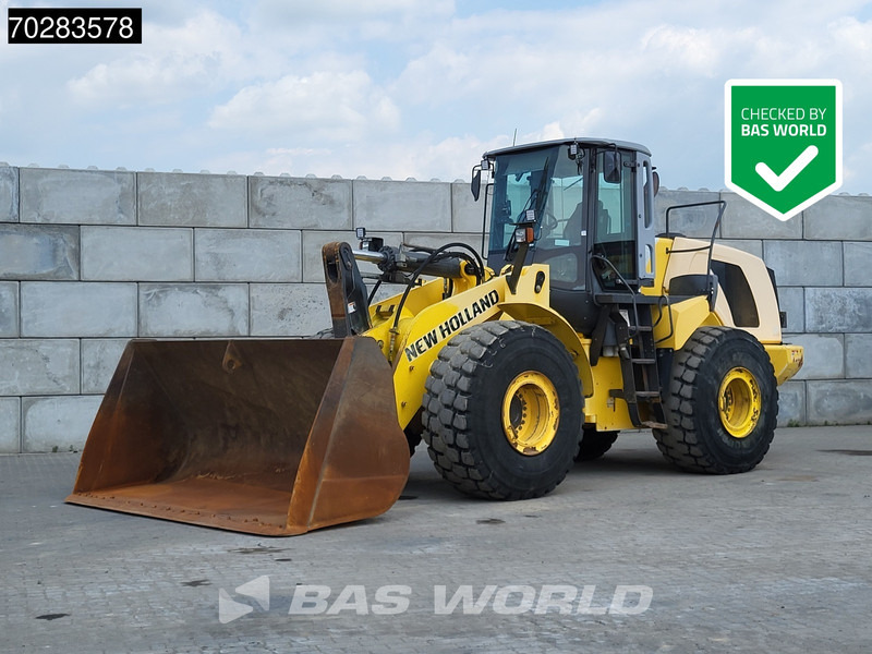 New Holland W270 - اللودر بعجل: صورة 1 New Holland W270 - اللودر بعجل: صورة 1