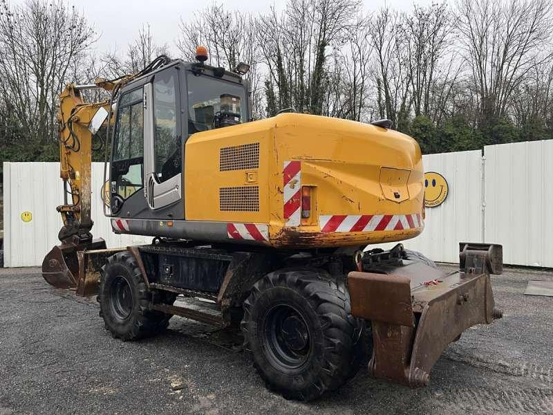 Hitachi ZX140W-3 - حفارة دولاب: صورة 4 Hitachi ZX140W-3 - حفارة دولاب: صورة 4