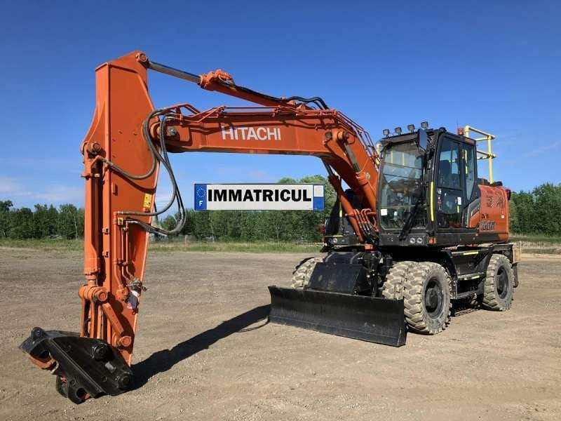 Hitachi ZX180W-7 - حفارة دولاب: صورة 1 Hitachi ZX180W-7 - حفارة دولاب: صورة 1