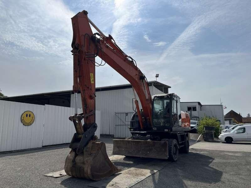 Hitachi ZX210W-3 - حفارة دولاب: صورة 2 Hitachi ZX210W-3 - حفارة دولاب: صورة 2