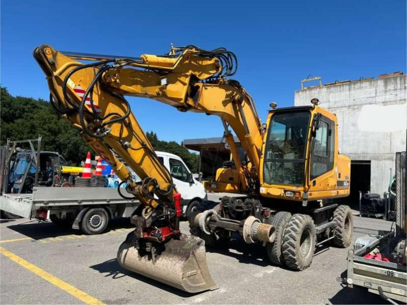 Hyundai ROBEX 140W-7 - حفارة دولاب: صورة 1 Hyundai ROBEX 140W-7 - حفارة دولاب: صورة 1