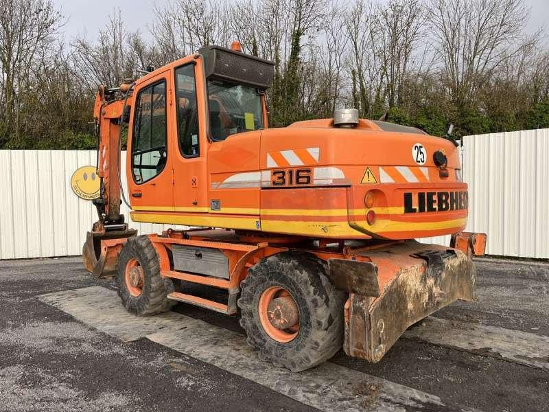 Liebherr A316 LITRONIC - حفارة دولاب: صورة 4 Liebherr A316 LITRONIC - حفارة دولاب: صورة 4